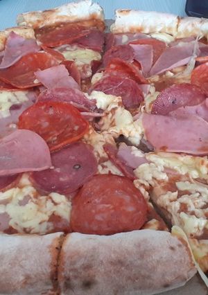 Una foto de Pizza doble queso