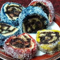 A picture of Colourful swiss rolls.