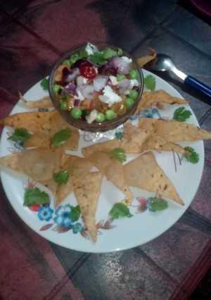 A picture of Roasted tomato with fruit salsa.