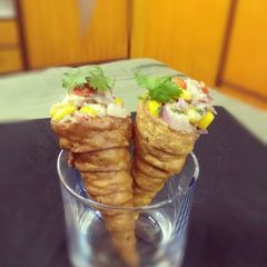 A picture of Cheesy corn cone.