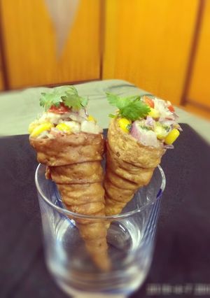 A picture of Cheesy corn cone.