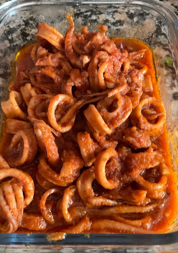 Una foto de Pota con tomate