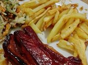 Una foto de cerdo agridulce con miel