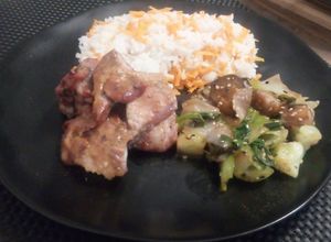 Una foto de Pechito de Cerdo con Manta Horneado (acompañado de Vegetales)