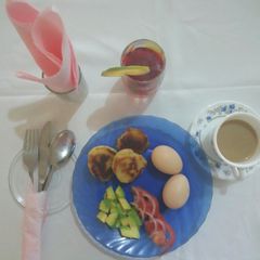 Drop scones, juice, boiled eggs, tea &salad #Eldy bfast contest A picture of Drop scones, juice, boiled eggs, tea &salad #Eldy bfast contest.