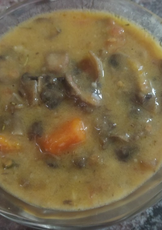 Una foto de Champiñones en salsa