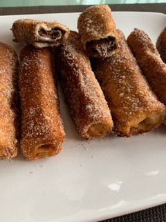 Una foto de Canutillos de torrijas con Nutella