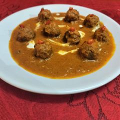 A picture of Potato dom kofta curry.