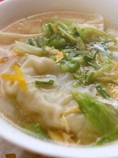A picture of Gyoza with Lettuce and Egg Soup.