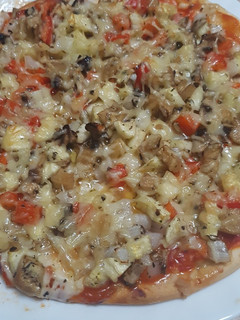 Una foto de Pizza vegetariana