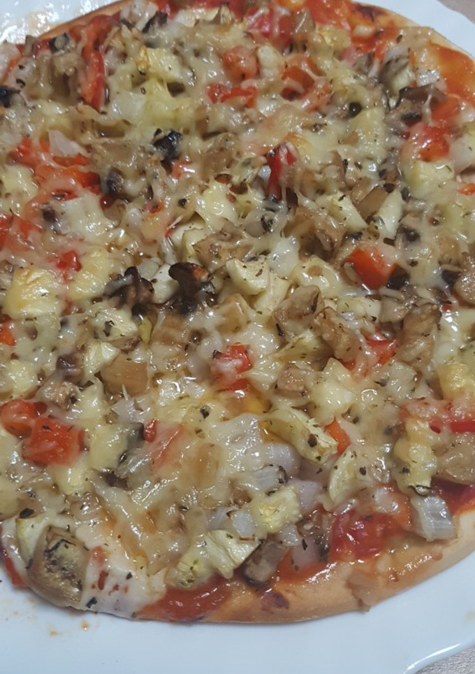 Una foto de Pizza vegetariana