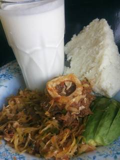 A picture of Meat cabbage mix, with ugali, avocado and mala.