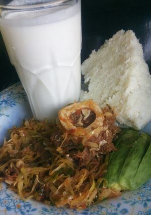 A picture of Meat cabbage mix, with ugali, avocado and mala.