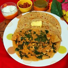 A picture of Palak Paneer Stuffed Paratha.