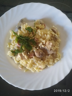 Una foto de Risotto con champiñón jamón y nata