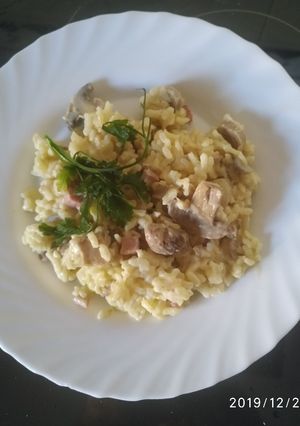 Una foto de Risotto con champiñón jamón y nata