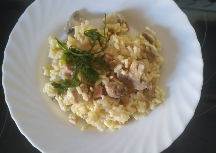 Risotto con champiñón jamón y nata