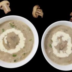 A picture of Cream of Mushroom (soup with fresh cream & spring onion).