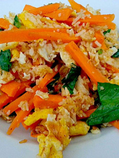 A picture of Stir fried rice and veggies.