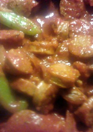 A picture of Italian sausage and peppers.