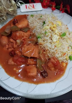 A picture of Shashlik with Chinese fried rice.