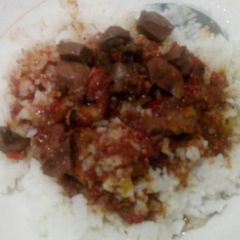 A picture of Coconut rice with wet fried liver.
