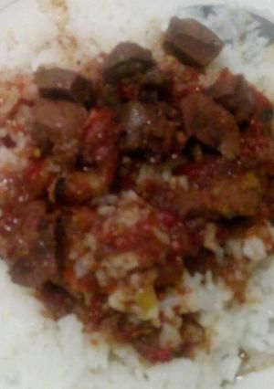 A picture of Coconut rice with wet fried liver.