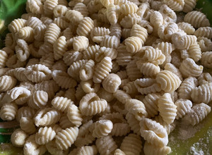 Una foto de Ñoquis caseros de papa sin huevo