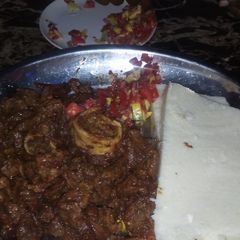 A picture of Ugali,Beef-wet fry and guacamoli.