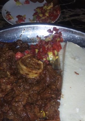 A picture of Ugali,Beef-wet fry and guacamoli.