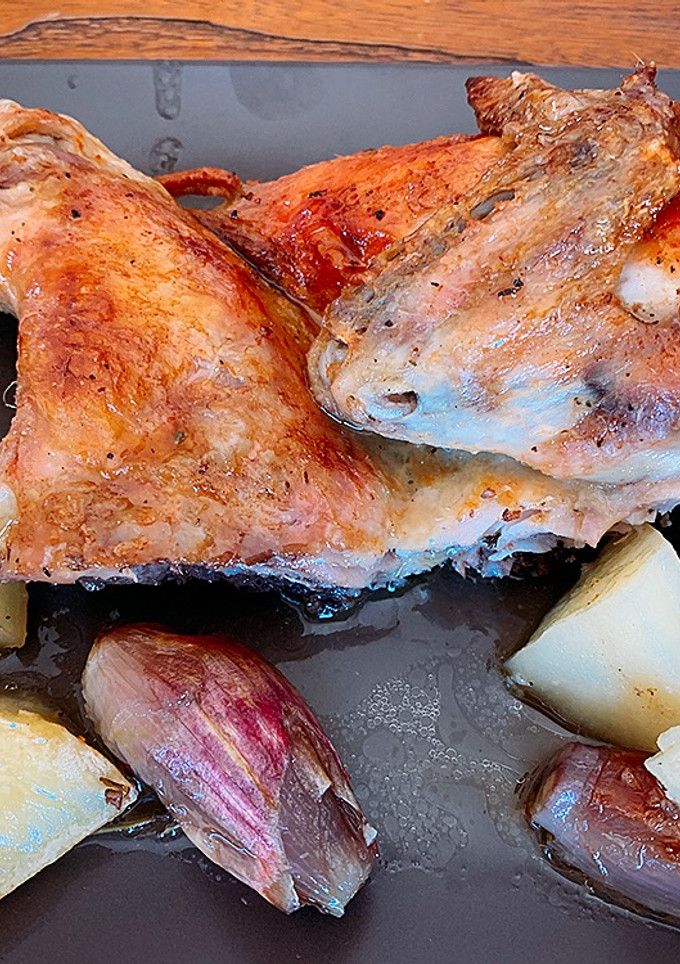 Una foto de Pollo tomatero abierto al horno