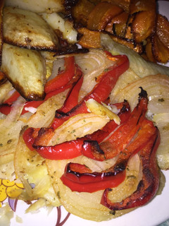 Una foto de Pescado con Verduras al Horno