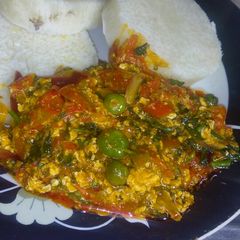 A picture of Garden egg /egg sauce with boiled yam.