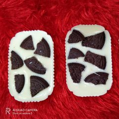 A picture of Yummy Oreo white chocolates in cups.