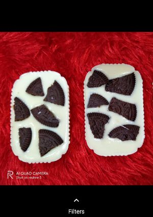 A picture of Yummy Oreo white chocolates in cups.