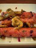 Salchichas con setas y vino quemado de Los Perdomos