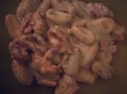 Une photo de sauce fromage pour gnocchis