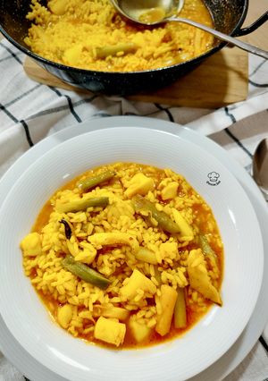 Una foto de Arroz meloso de sepia y ajos tiernos