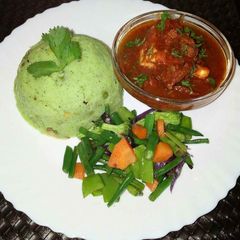 A picture of Mukimo beef stew and mixed vegetables.