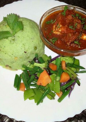 A picture of Mukimo beef stew and mixed vegetables.
