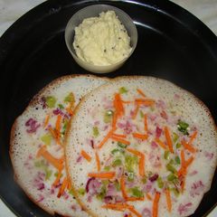 A picture of Vegetable mixed dosa.