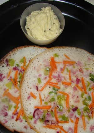A picture of Vegetable mixed dosa.