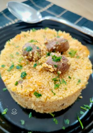 Una foto de Cous cous con carrillada y verduras