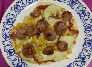 Una foto de Pizza en la freidora de aire