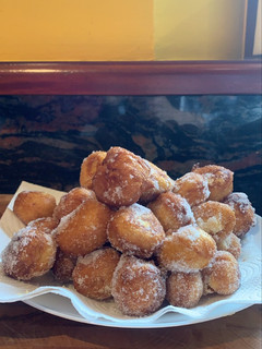 Una foto de Buñuelos de viento con crema pastelera