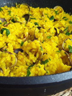 Una foto de Arroz meloso con almejas