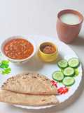 Kathiyavadi lunch :Fresh lobiya Curry, Roti, Cucumber Slices, Pickle & buttermilk