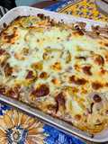 Gratin de courgettes jaunes et poivrons bicolores au jambon, mozzarella et crème de parmesan