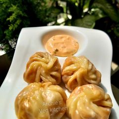 A picture of Red pasta momos.