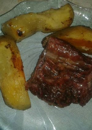 Una foto de Tapa de asado con papas al horno